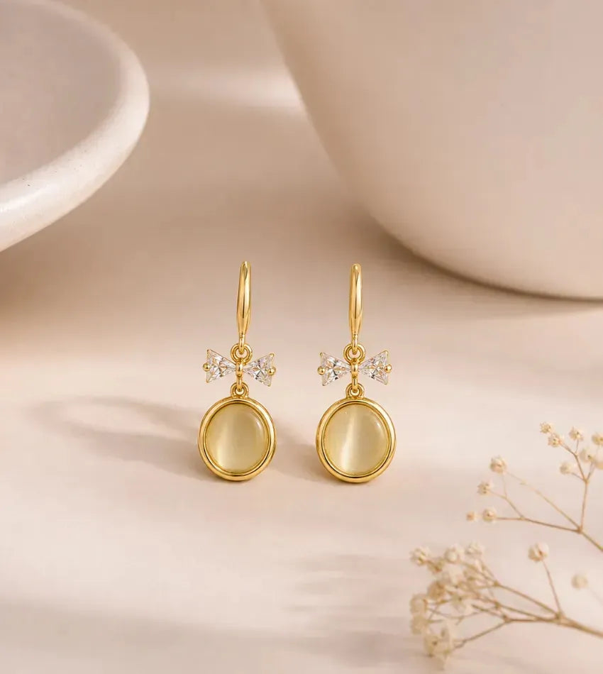 bow pearl drop earrings