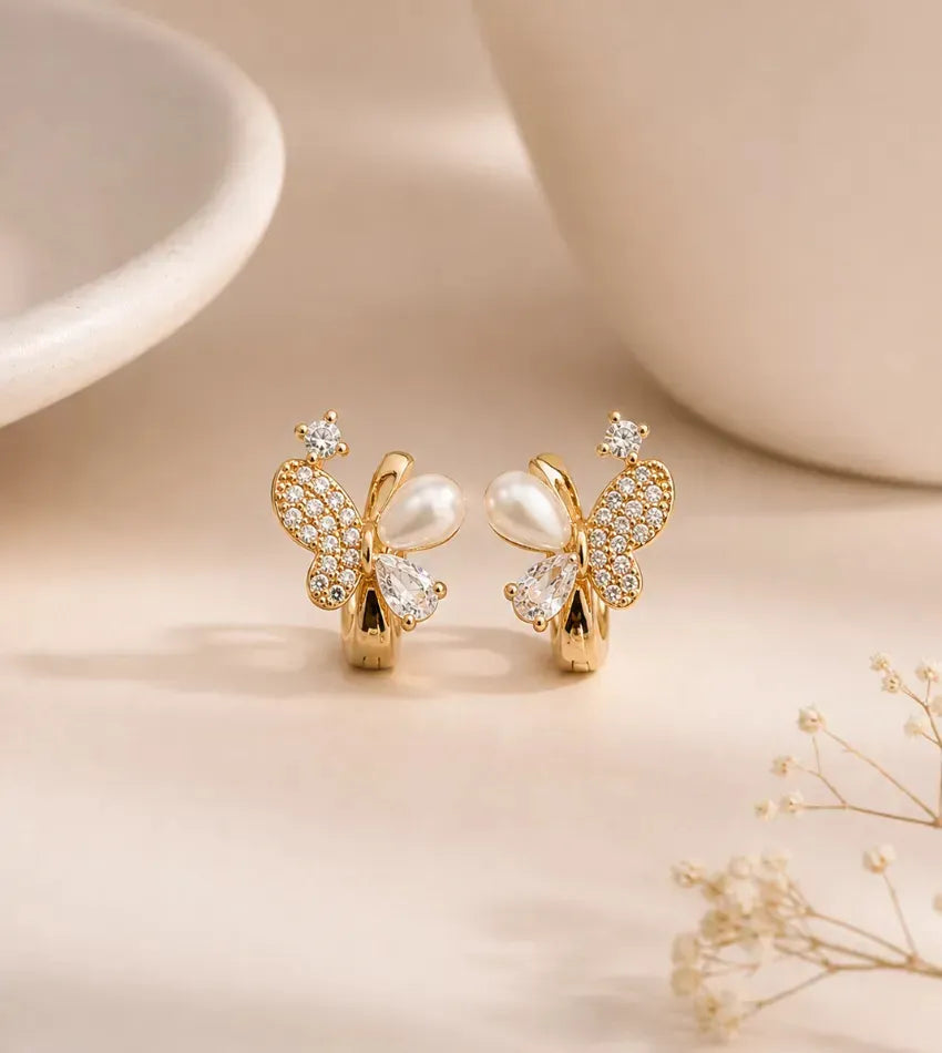 butterfly pearl earrings