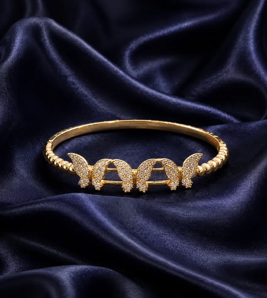 gold tone butterfly bangle