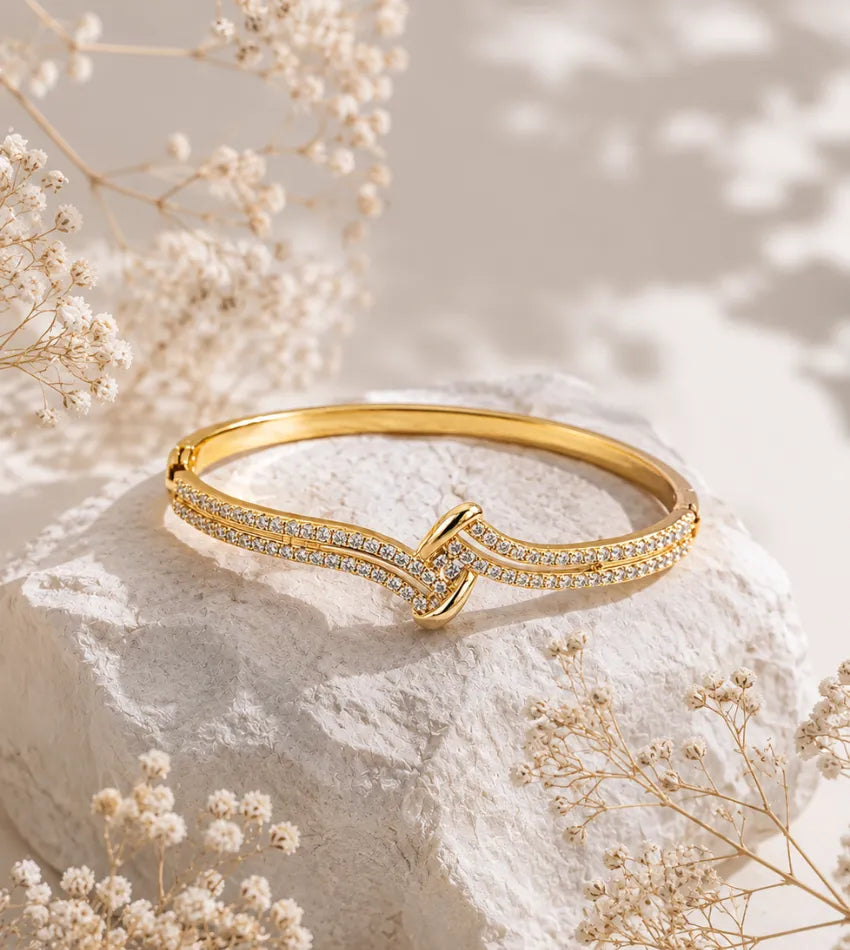 gold tone designer bangle