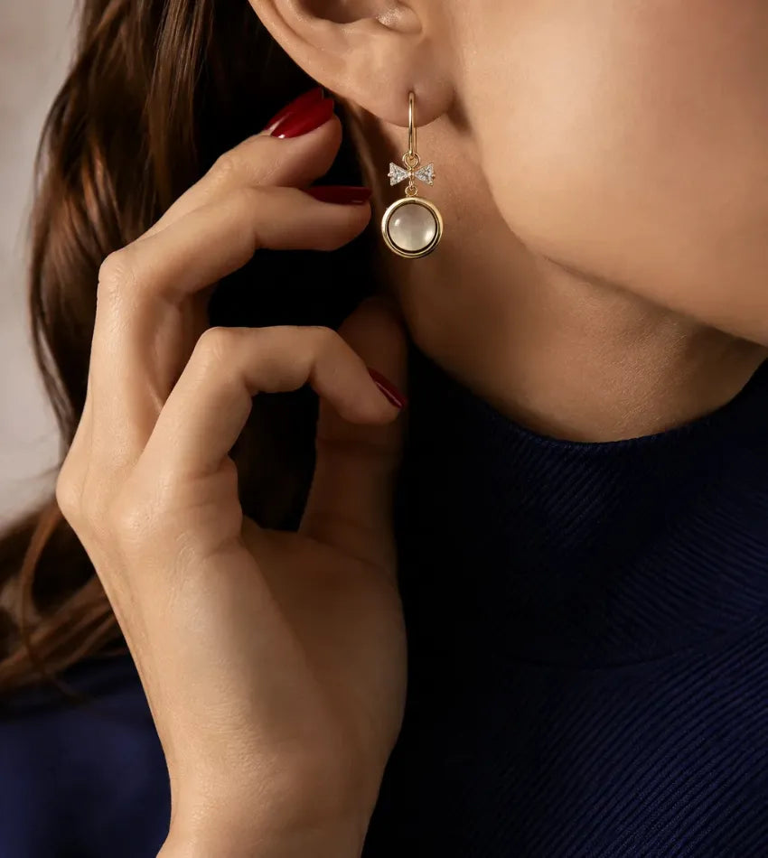 pearl look bow earrings