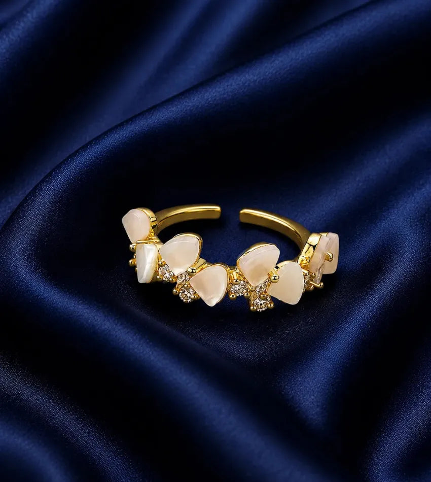 white petal stone ring