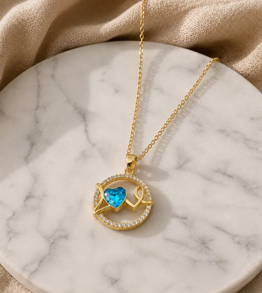women blue heart pendant