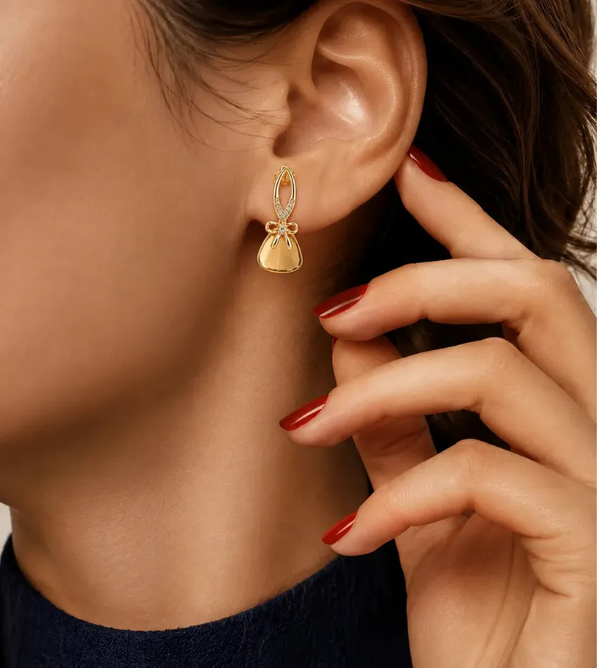 women bow dangle earrings