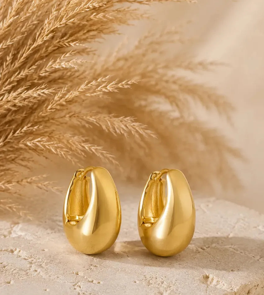 women gold earrings
