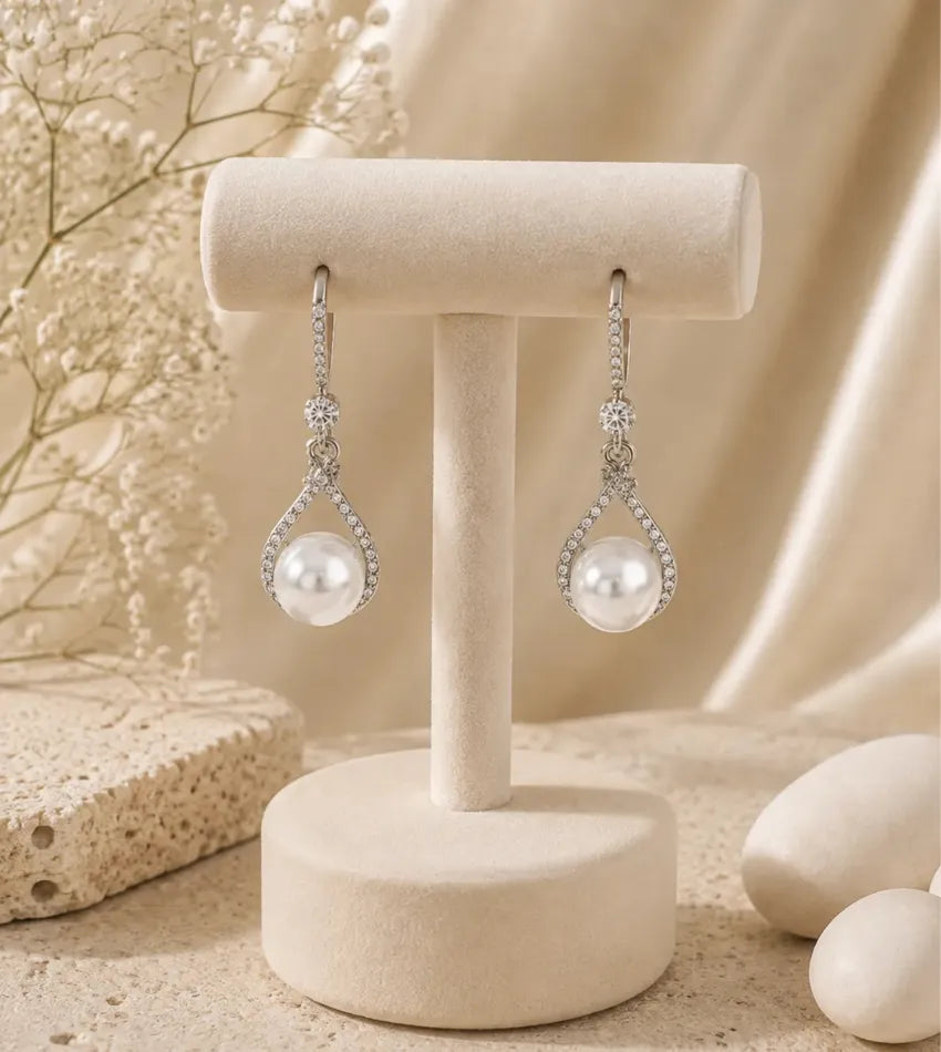 women pearl drop earrings