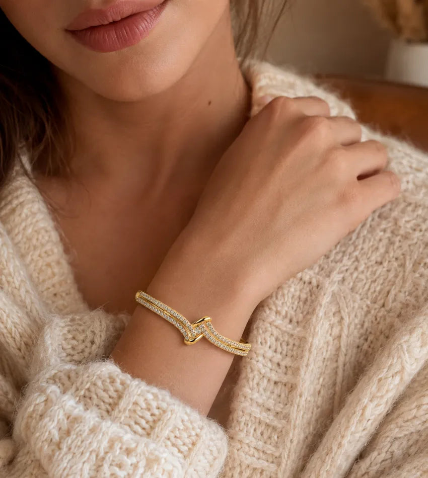 women stone studded bangle